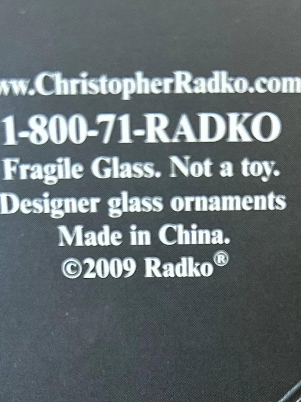 Christopher Radko Red Cardinal Glass Ornament with Green and Gold Accents